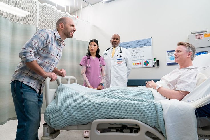 Paul Scheer as Ruben, Kahyun Kim as Serena, David Alan Grier as Dr. Ron, and David Hornsby as Harry in St. Denis Medical