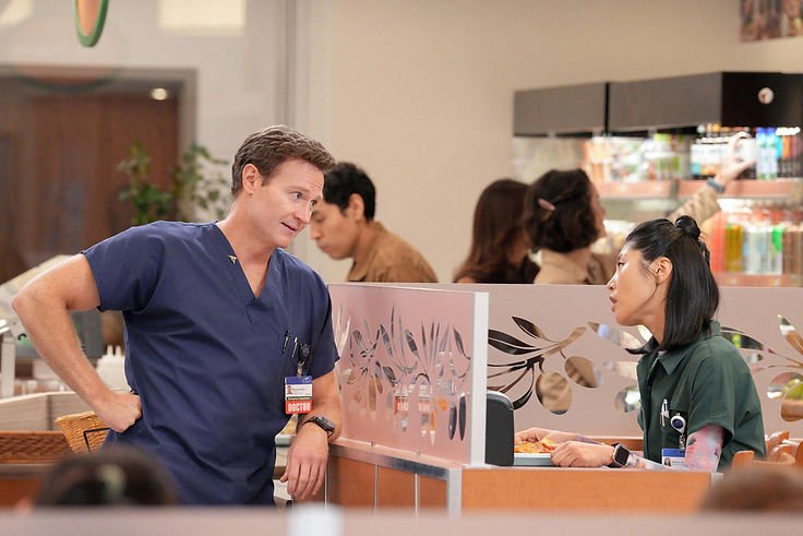 Josh Lawson as Bruce and Kahyun Kim as Serena in St. Denis Medica