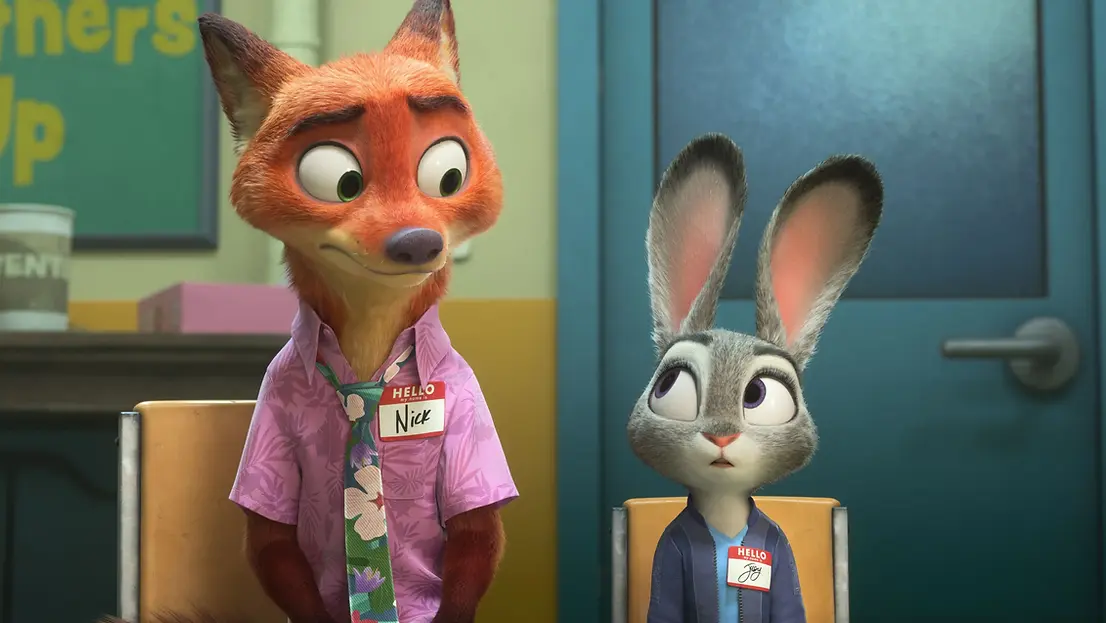 Jason Bateman as Nick Wilde and Ginnifer Goodwin as Judy Hopps sitting down with name badges staring at each otherin Zootropolis 2