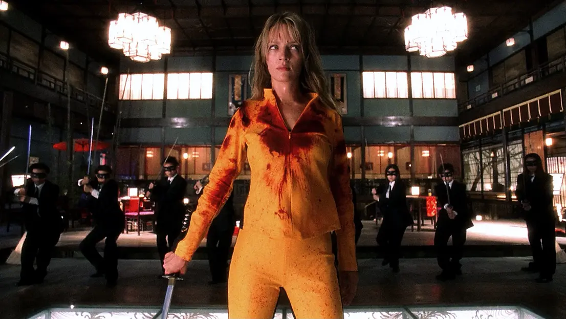 Uma Thurman as the Bride surrounded by members of the Crazy 88 in Kill Bill: The Whole Bloody Affair