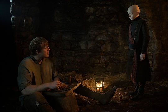 Dexter Sol Ansell as Egg stands over Peter Claffey as Ser Duncan the Tall in 'A Knight of the Seven Kingdoms'