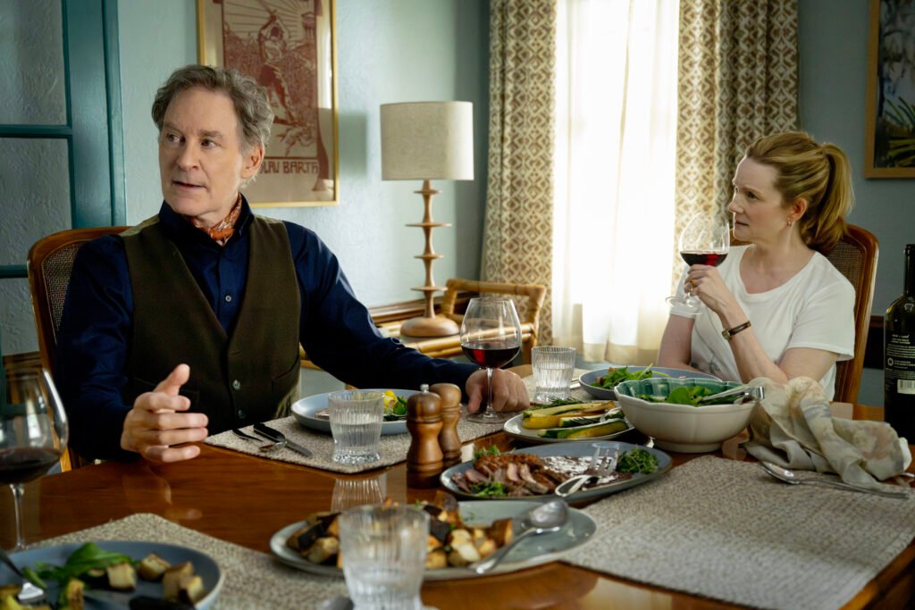 Kevin Kline as Richard Bean, Laura Linney as Kristen Forrest-Bean sat at the dinner table in American Classic