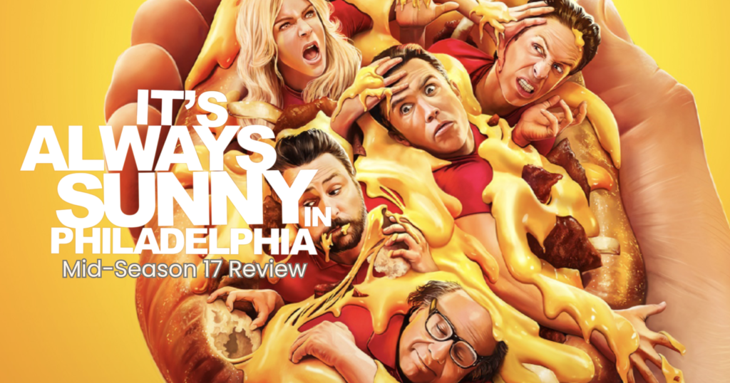 The cast of It's Always Sunny in Philadelphia covered in ketchup and mustard and being held in a hot dog bun. Text reads "It's Always Sunny in Philadelphia Mid-Season 17 Review"