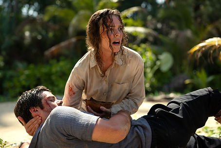 Rachel McAdams as Linda cradles an injured Dylan O'Brien as Bradey in Send Help